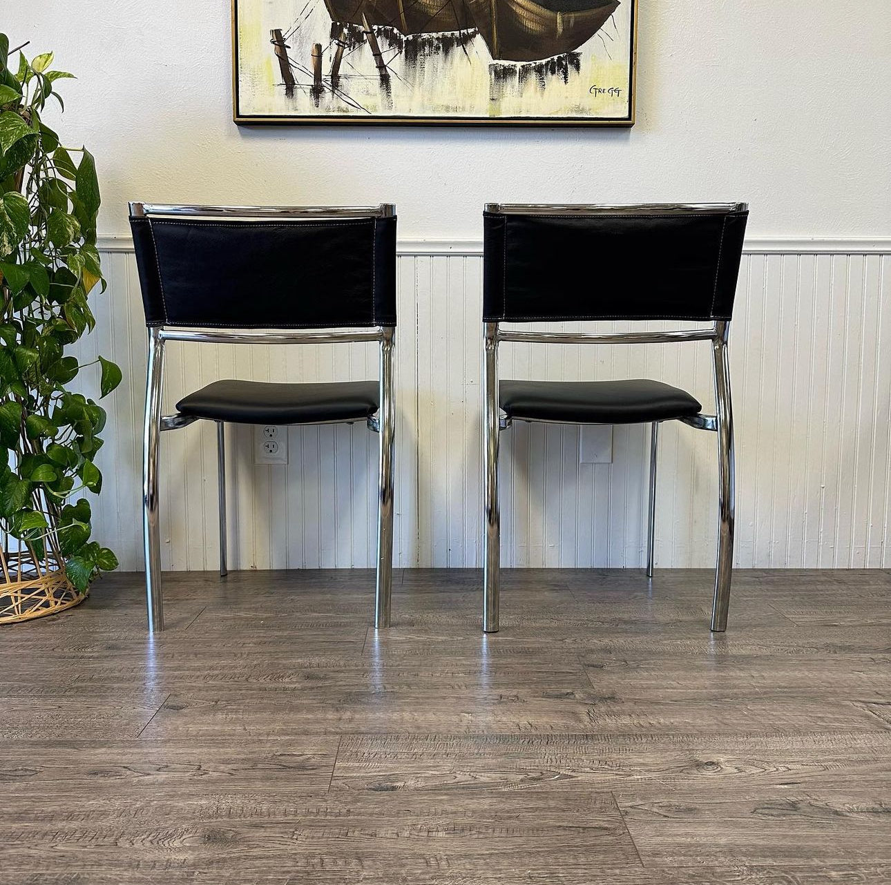 A Pair Of Chrome, Leather Chairs