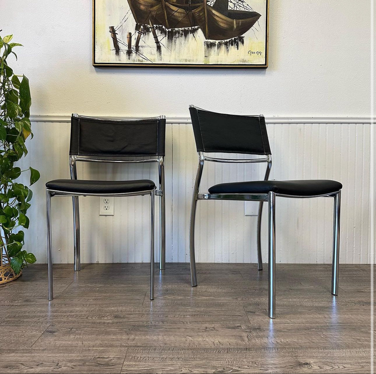 A Pair Of Chrome, Leather Chairs