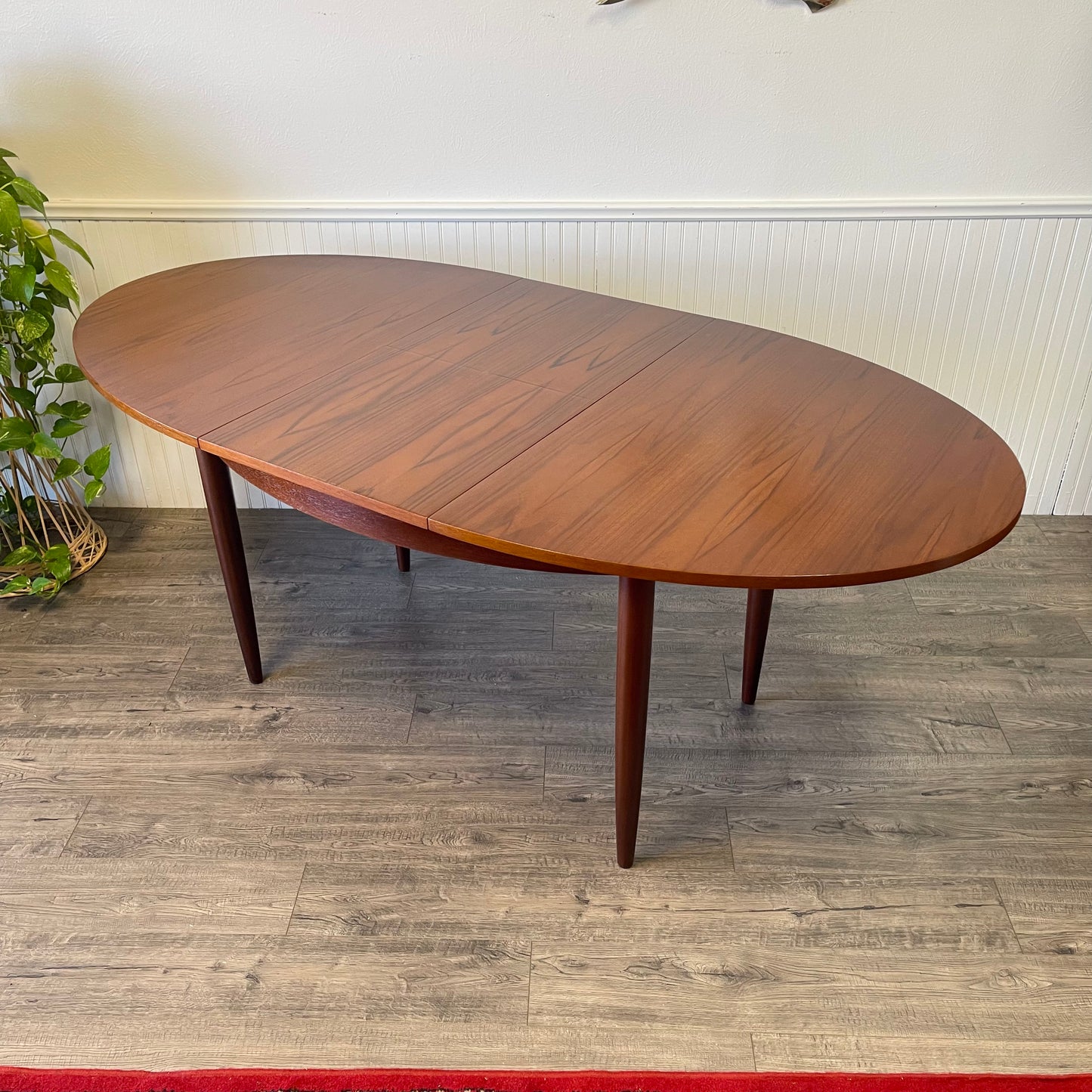 Mid Century Danish Teak Butterfly Leaf Table.