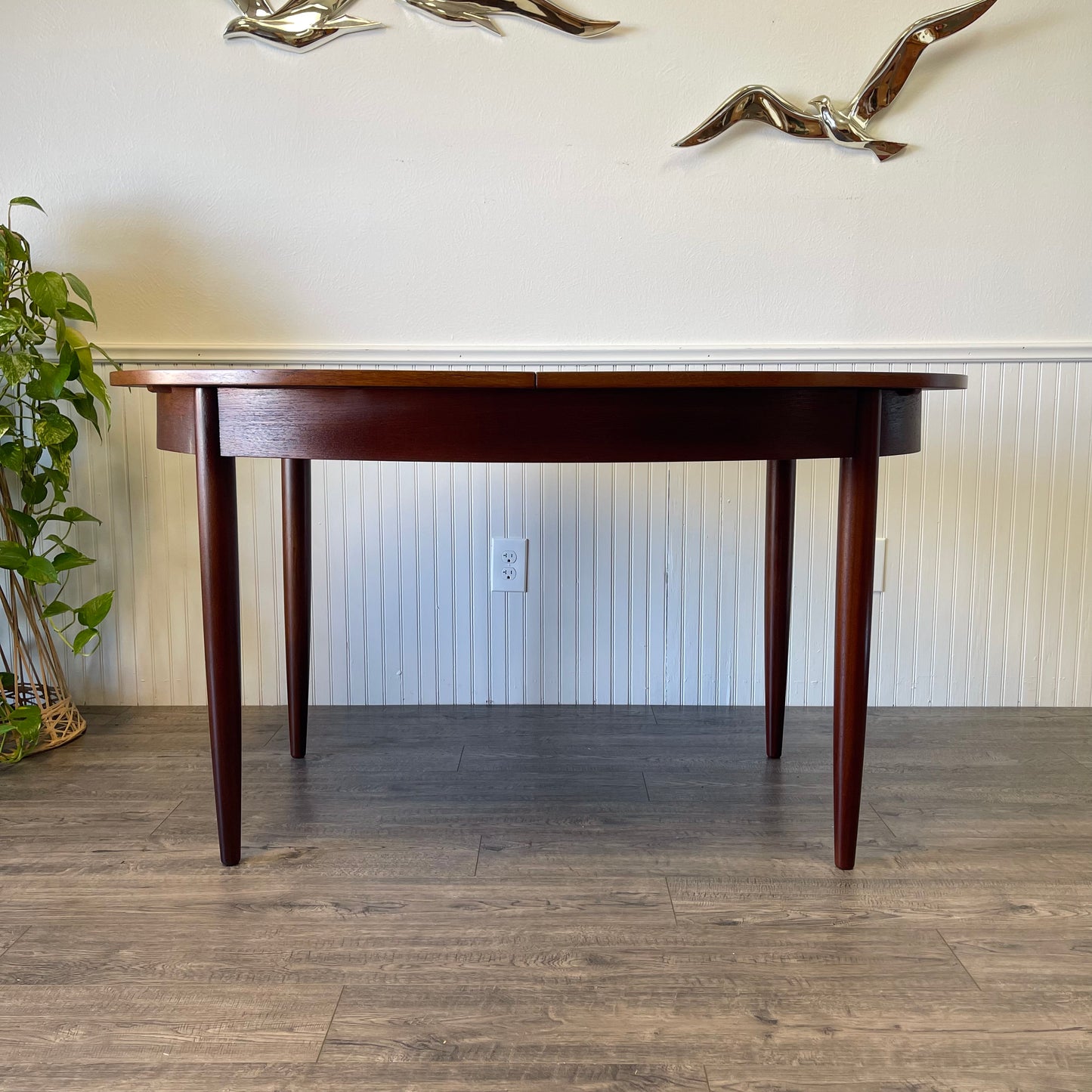 Mid Century Danish Teak Butterfly Leaf Table.